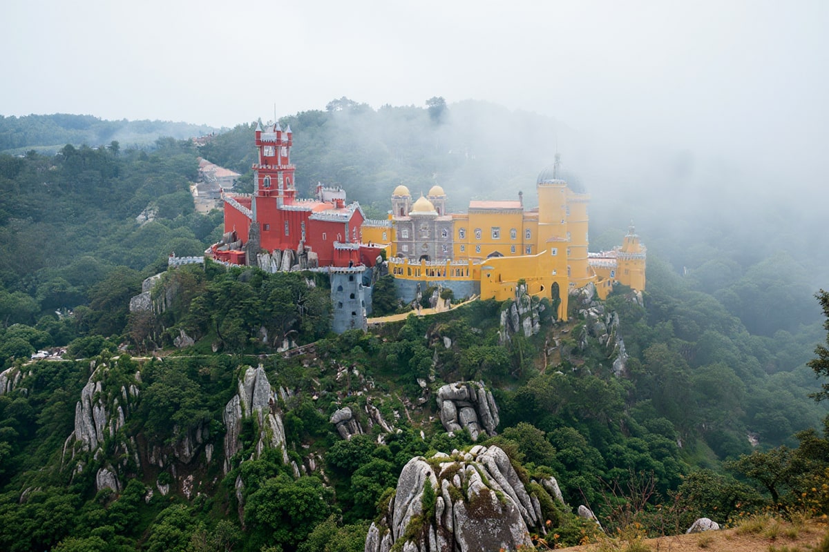 Pena Palace surrounded by mist during winter